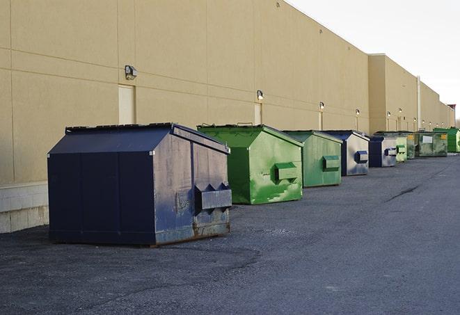 an arrangement of durable and robust disposal containers utilized on a construction project in Aledo